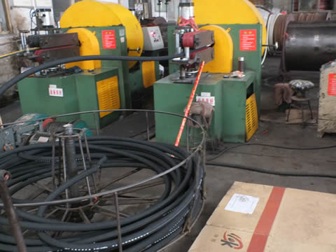 A worker is operating machine to remove water cloth.